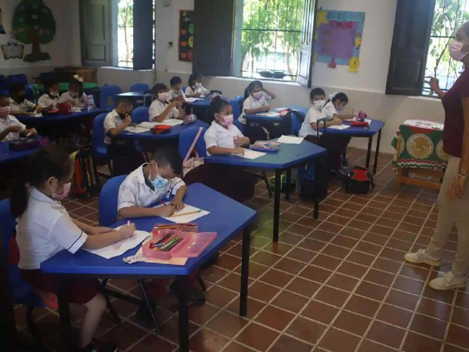 Niñas y niños en clase. Foto: Cuartoscuro Archivo.